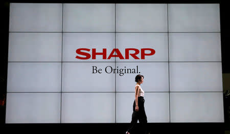 FILE PHOTO: A logo of Sharp Corp is pictured at the CEATEC JAPAN 2017 (Combined Exhibition of Advanced Technologies) at the Makuhari Messe in Chiba, Japan, October 2, 2017. REUTERS/Toru Hanai/File Photo