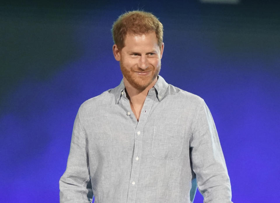 FILE - Prince Harry, Duke of Sussex, speaks at "Vax Live: The Concert to Reunite the World" in Inglewood, Calif., on May 2, 2021. Prince Harry, whose memoir “Spare” sold more than 3.2 million copies worldwide after just one week of publication and will likely rank among the bestselling memoirs of all time, failed to receive a Grammy nomination for narrating the audiobook version. (Photo by Jordan Strauss/Invision/AP, File)