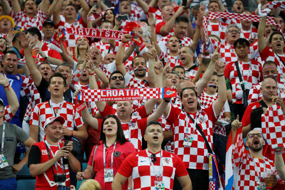 <p>Croatia fans inside the stadium yell before the match against Russia in Sochi on Saturday. (Reuters) </p>