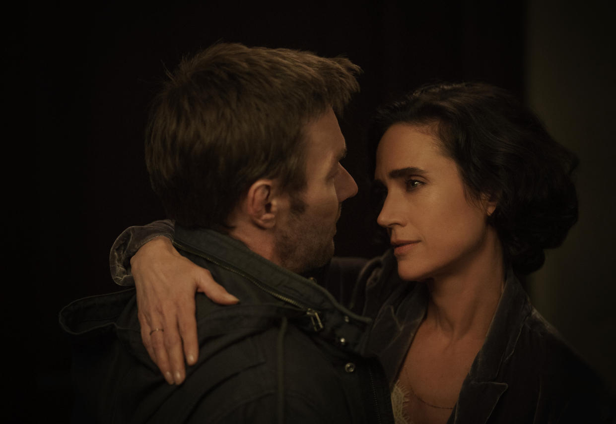 Joel Edgerton and Jennifer Connelly in the subdued lighting of 