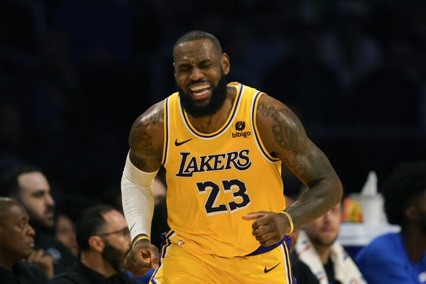 Los Angeles Lakers forward LeBron James reacts after missing a three point attempt during the second half of an NBA basketball game against the Orlando Magic, Monday, Oct. 30, 2023, in Los Angeles. (AP Photo/Ryan Sun)