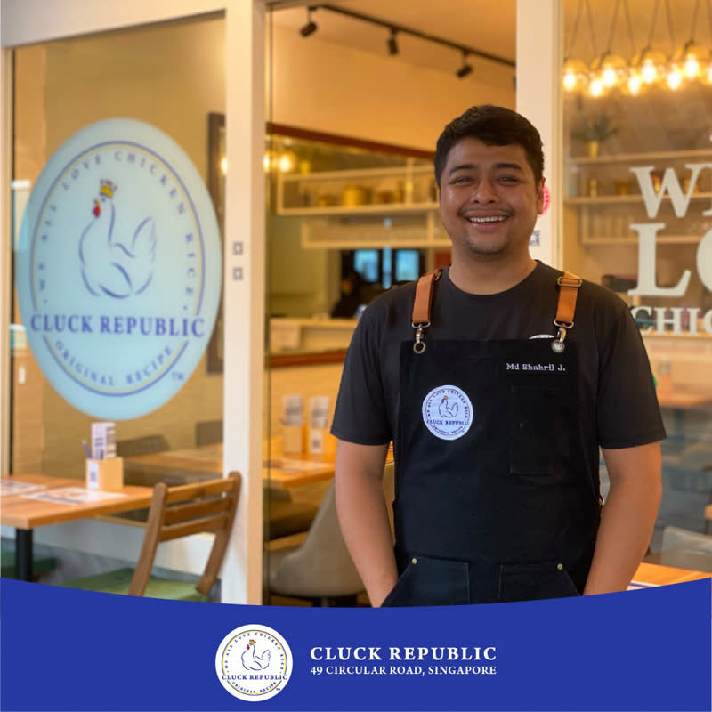 Image of Head Chef Shahril with shopfront of Cluck Republic