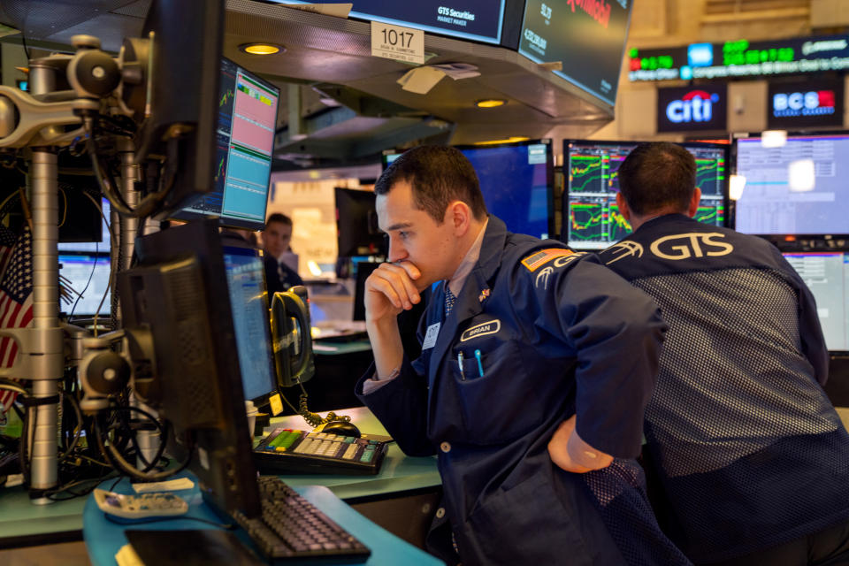 NEW YORK, NY - MARCH 04: Traders work the floor of the New York Stock Exchange (NYSE) on March 4, 2020 in New York City.  The news of Democratic presidential candidate, former Vice President Joe Biden's delegate lead after the Super Tuesday primaries helped the market rebound and close at over 1,100 points. (Photo by David Dee Delgado/Getty Images)