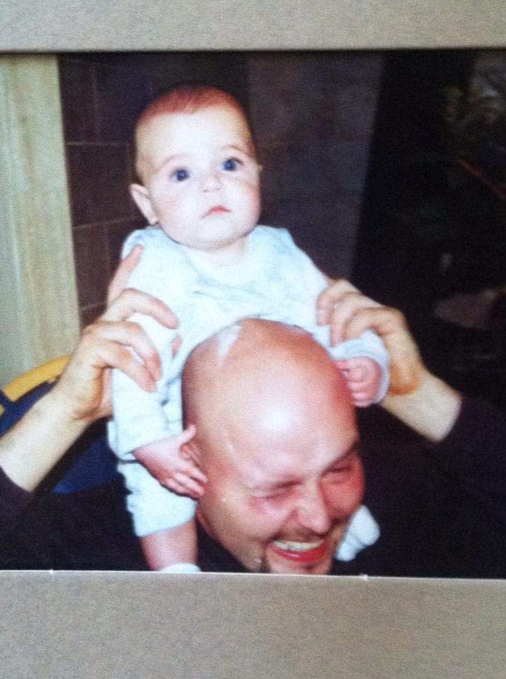 Gavin Sorge Sr. holds his son Gavin Jr. as a baby.