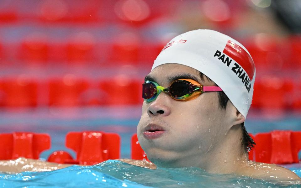 China's Pan Zhanle takes part in warm up prior to an evening finals session of the swimming event during the Paris 2024 Olympic Games at the Paris La Defense Arena in Nanterre, west of Paris, on August 1, 2024