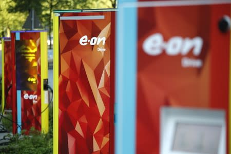 FILE PHOTO: Electric car parking place with the charging stations is seen at the front of the German utility E.ON headquarters in Essen