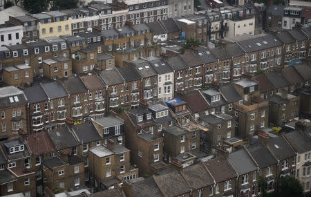 FILE PHOTO: Rows of houses are seen in North Kensington, London, Britain June 29, 2017. REUTERS/Hannah McKay