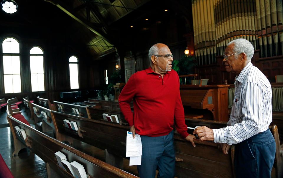 Longtime civil rights activists Robert "Bob" Moses, left, and Hollis Watkins speak at Tougaloo College, Friday, Aug. 2, 2013, in Jackson, Miss.