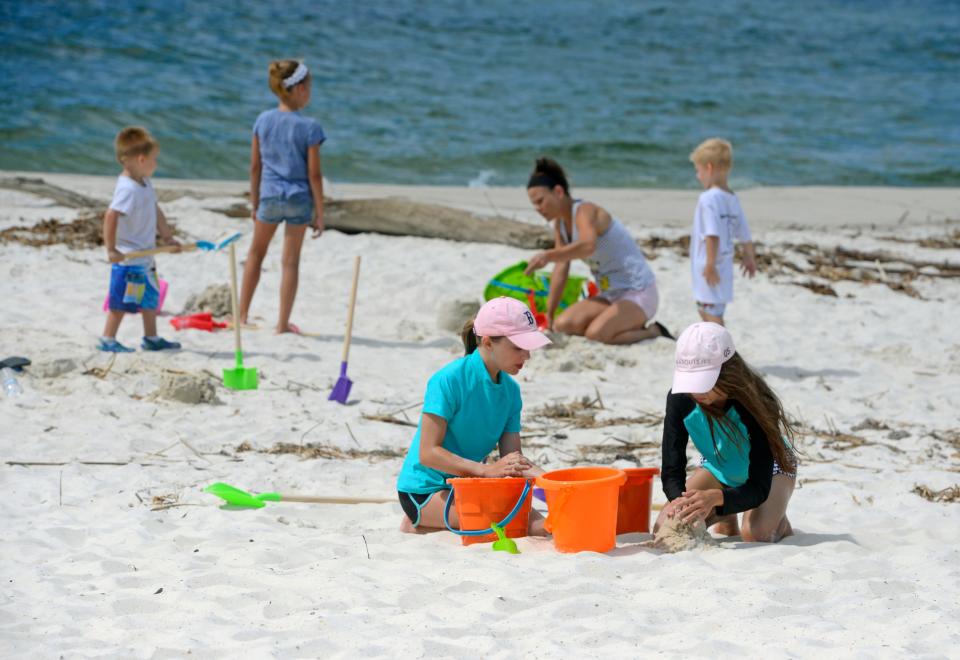 Visitors compete in the sand sculpture competition during a past World Ocean Day.