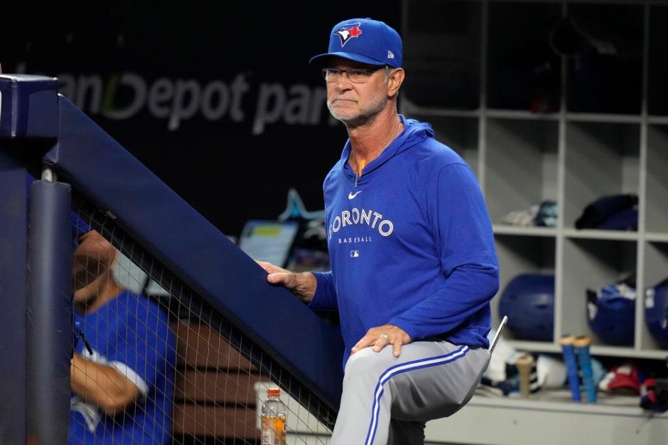 Toronto Blue Jays bench coach Don Mattingly looks from the dugout during the first inning of a baseball game against the Miami Marlins, Monday, June 19, 2023, in Miami. (AP Photo/Lynne Sladky)