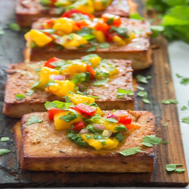 Blocks of tofu with colorful salsa on top