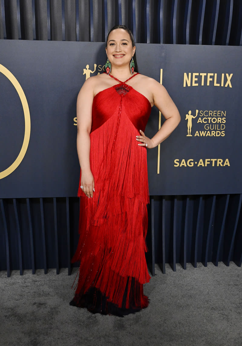 Lily Gladstone in a red dress at the 30th Annual Screen Actors Guild Awards held at the Shrine Auditorium & Expo Hall on February 24, 2024 in Los Angeles, California.