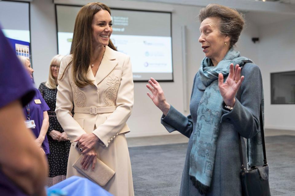 Princess Anne, The Princess Royal, Patron of the Royal College of Midwives (RCM), and Catherine, Duchess of Cambridge, Patron of the Royal College of Obstetricians and Gynaecologists (RCOG), watch a demonstration of a mock emergency caesarian operation by Dr Katie Cornthwaite using a dummy during a visit the RCM and RCOGs headquarters on April 27, 2022 in London, England