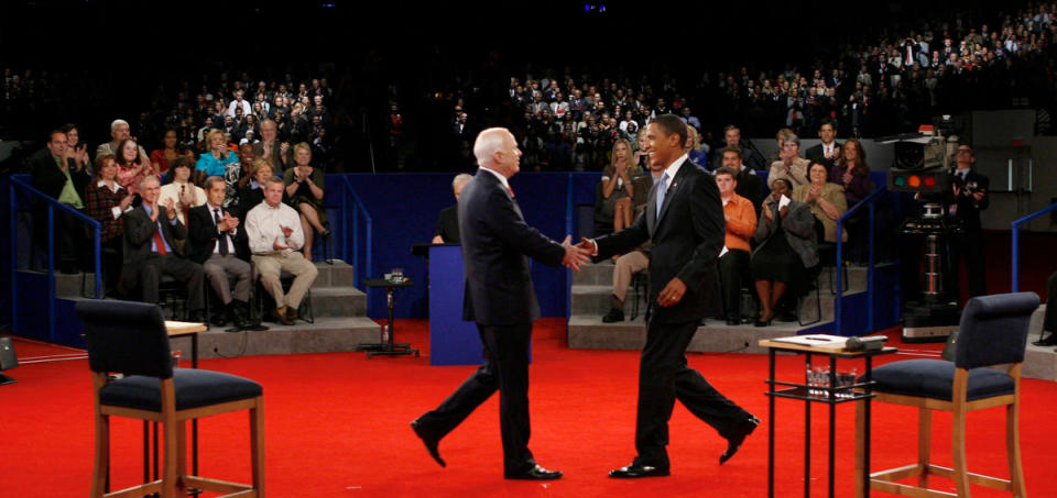 Democratic presidential candidate Sen. Barack Obama (D-Ill.), right, and Republican presidential candidate Sen. John McCain (R-Ariz.), shake hands before the start of the town hall-style presidential debate at Belmont University in Nashville, Tenn., Oct. 7, 2008.