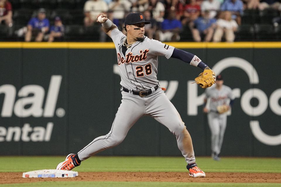 Tigers shortstop Javier Baez throws to first base during the fifth inning against the Rangers on Tuesday, June 27, 2023, in Arlington, Texas.