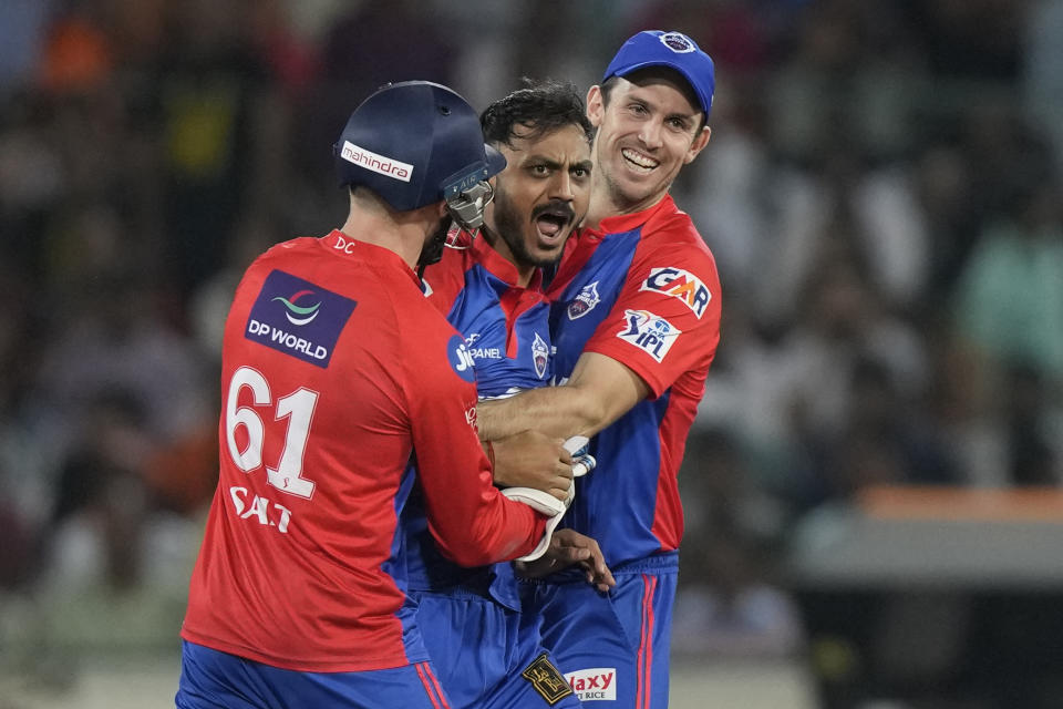 Delhi Capitals' Axar Patel,center, celebrates the wicket of Sunrisers Hyderabad's captain Aiden Markram during the Indian Premier League (IPL) cricket match between Sunrisers Hyderabad and Delhi Capitals, in Hyderabad, India, Monday, April 24, 2023. (AP Photo/Mahesh Kumar A.)