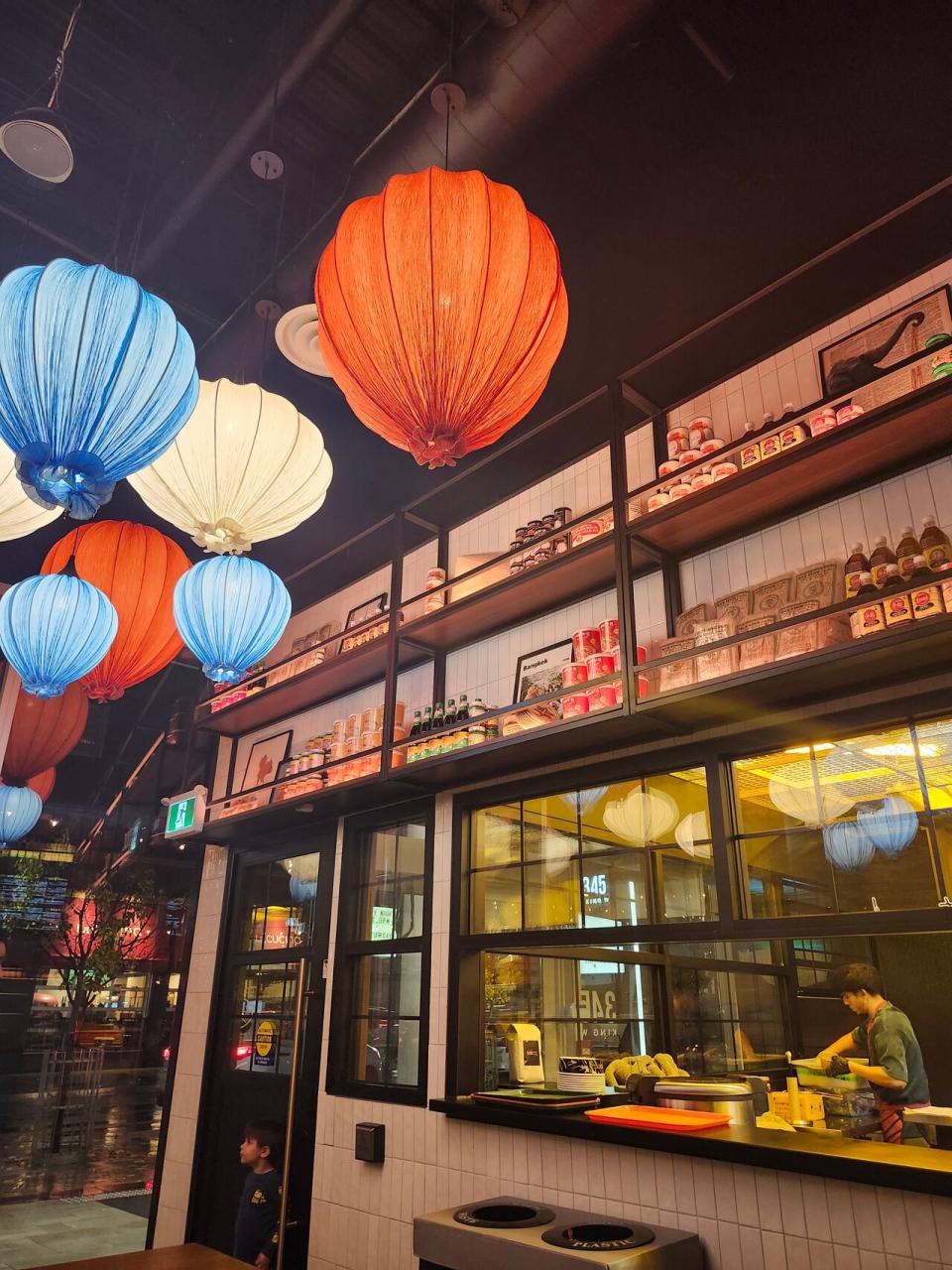 A restaurant worker prepares food at SOI Thaifoon, a Thai restaurant in downtown Kitchener, Ont.