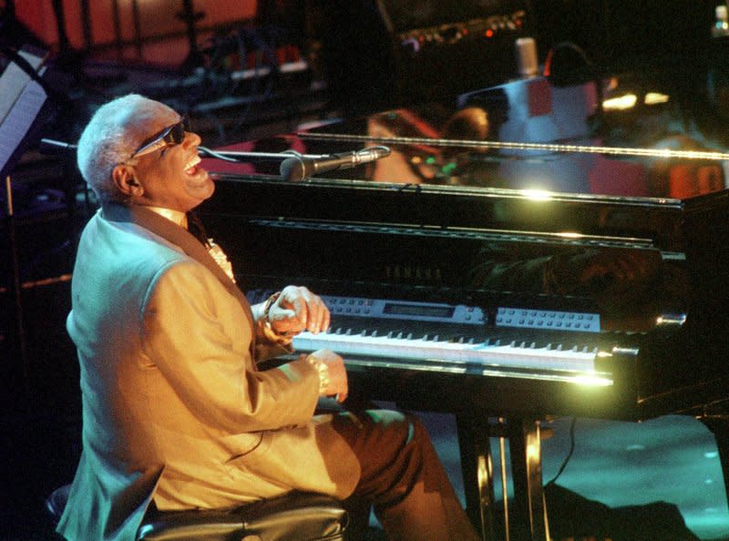 Singer Ray Charles performs a tribute to Rock and Roll Hall of Fame inductee Nat King Cole during ceremonies in New York on May 6, 2000. Charles died on this day in 2004. File Photo by Ezio Petersen/UPI