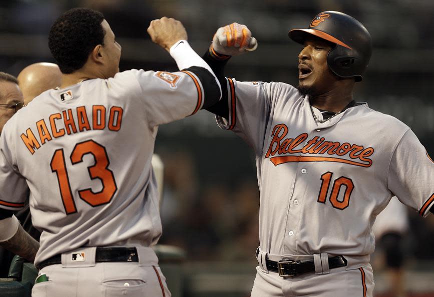 Baltimore Orioles Adam Jones celebrates with fans after the