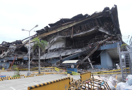 A view of a mall after it was gutted by fire in Davao city, Philippines, December 29, 2017. REUTERS/Lean Daval Jr