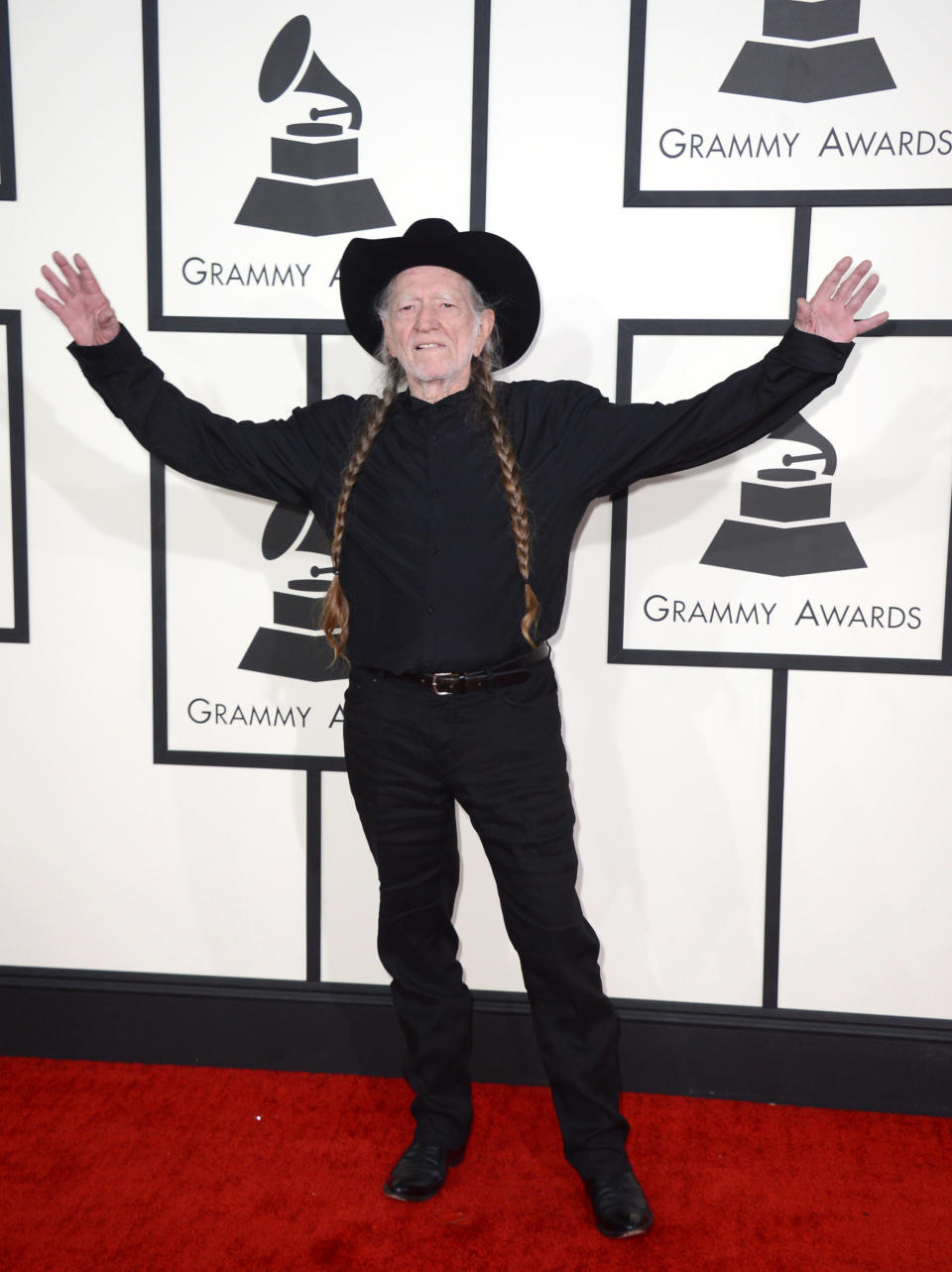 Willie Nelson arrives at the 56th annual GRAMMY Awards at Staples Center on Sunday, Jan. 26, 2014, in Los Angeles. (Photo by Jordan Strauss/Invision/AP)