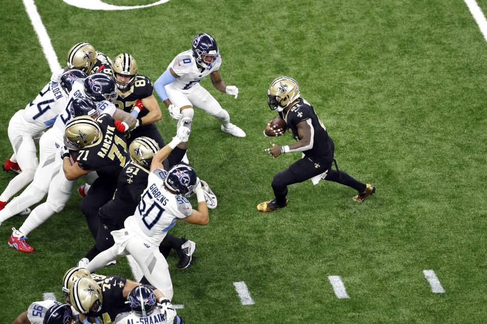 New Orleans Saints running back Jamaal Williams (21) runs the ball during game against the Tennessee Titans, Sunday, Sep. 10, 2023, in New Orleans. | Tyler Kaufman, Associated Press
