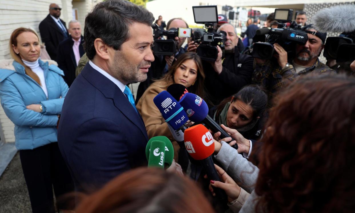 <span>The president of the far-right Chega party, André Ventura, talks to the media after casting his ballot at a polling station in Lisbon.</span><span>Photograph: Miguel A Lopes/EPA</span>