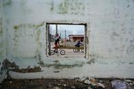 The Wider Image: A Cuban fishing village ponders its options as U.S. policy shifts