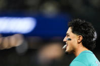 Seattle Mariners' Josh Rojas reacts after grounding out against the Arizona Diamondbacks to end the third inning of a baseball game Saturday, April 27, 2024, in Seattle. (AP Photo/Lindsey Wasson)