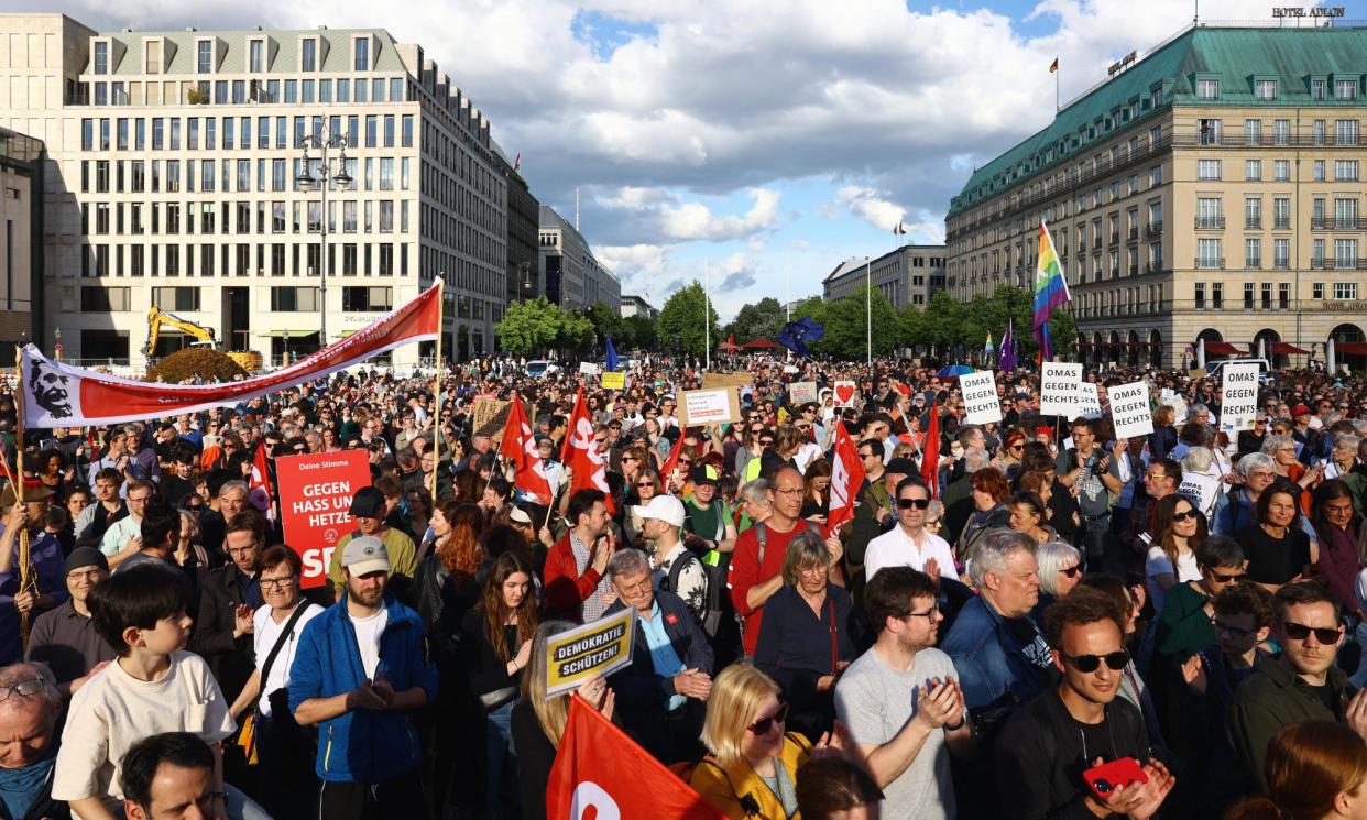 <span>Protesters gather for a demonstration in front of the Brandenburg Gate in Berlin against the far right and to condemn attacks on politicians.</span><span>Photograph: Christian Mang/AFP/Getty Images</span>