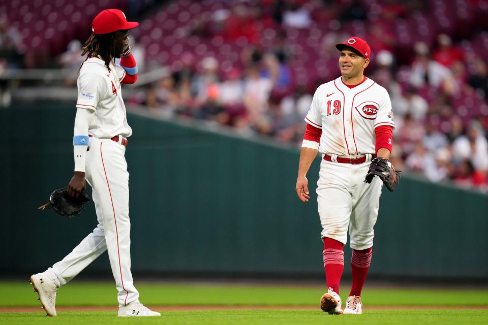 Cincinnati Reds first baseman Joey Votto has guided players like Elly De La Cruz, and he said he has also learned a lot from them.