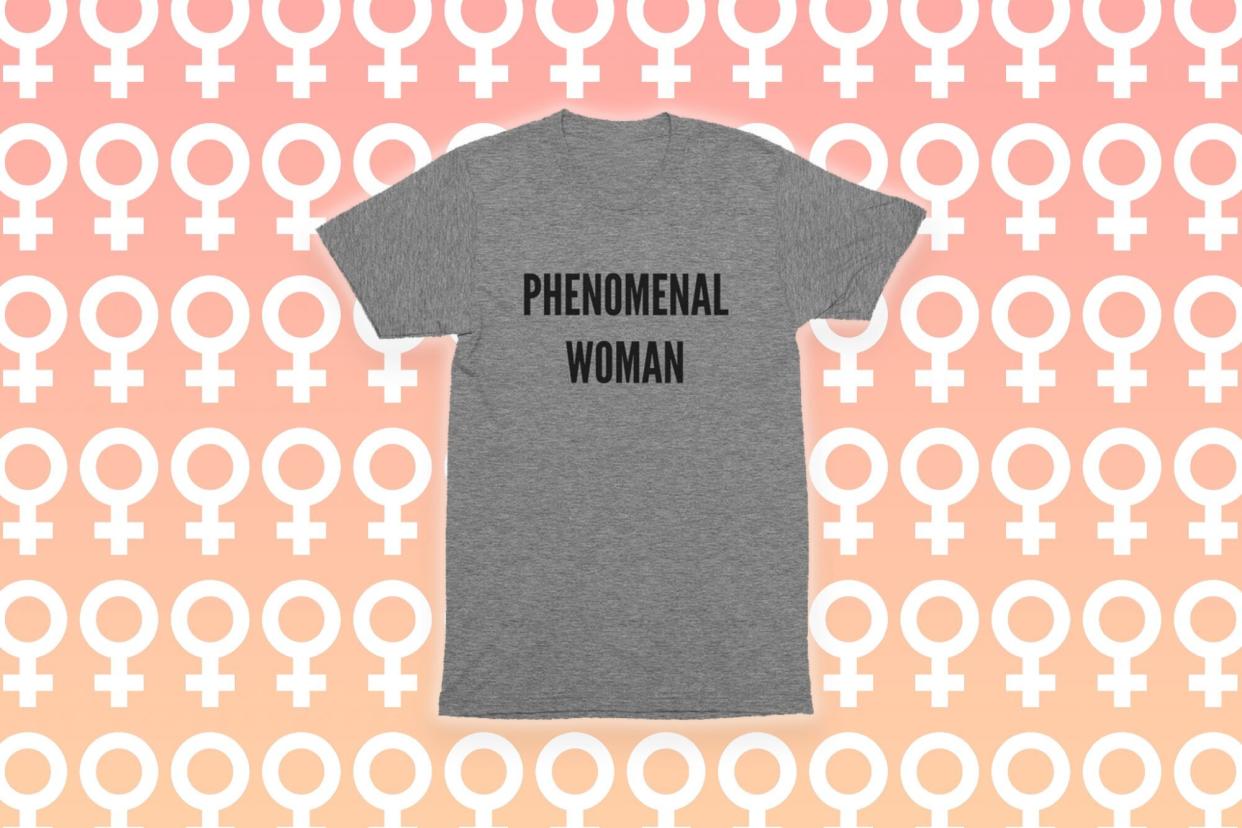 gray "phenomenal women" tshirt on pink background with white symbol for women pattern