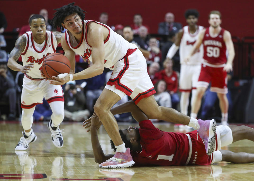 Rutgers guard Geo Baker (0) steals the ball from Indiana guard Al Durham (1) during the first half of an NCAA college basketball game, Wednesday, Jan. 15, 2020 in Piscataway, N.J. (Andrew Mills/NJ Advance Media via AP)