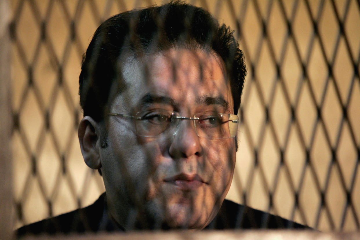 Opposition leader Ayman Nour stands in a court in Cairo January 23, 2007. (Nasser Nuri/Reuters)