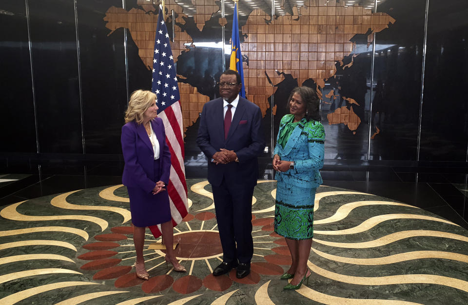 U.S. First Lady Jill Biden, left, with Namibian President Hage Geingob, center, and Namibian First Lady Monica Geingos, at State House in Windhoek, Namibia Wednesday, Feb. 22, 2023. Biden is in the country as part of a commitment by President Joe Biden to deepen U.S. engagement with the region. (AP Photo/Dirk Heinrich)