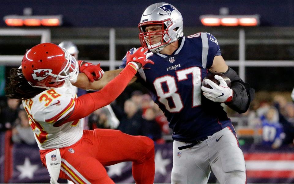 Rob Gronkowski stiff arms Ron Parker during the Patriots' 43-40 win over the Chiefs back in October - AP