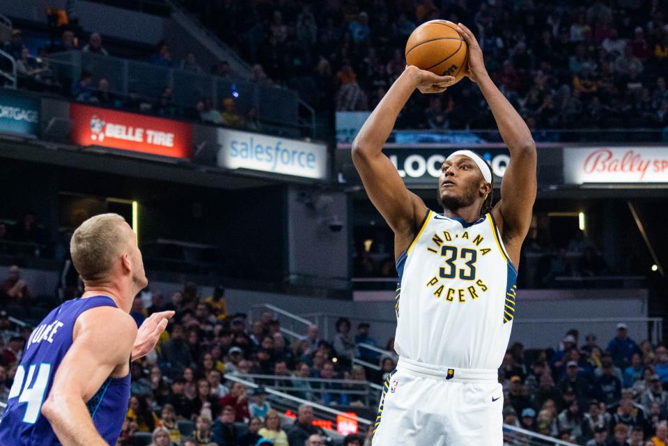 Jan 8, 2023; Indianapolis, Indiana, USA; Indiana Pacers center Myles Turner (33) shoots the ball in the first quarter against the Charlotte Hornets at Gainbridge Fieldhouse.