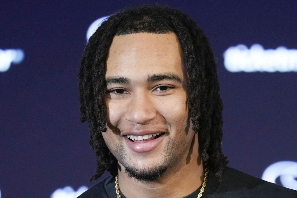 FILE - Houston Texans quarterback C.J. Stroud speaks to the media following the team's win over the Tennessee Titans in an NFL football game Sunday, Dec. 31, 2023, in Houston. Stroud is a finalist for The Associated Press 2023 Offensive Rookie of the Year. (AP Photo/Eric Christian Smith, File)