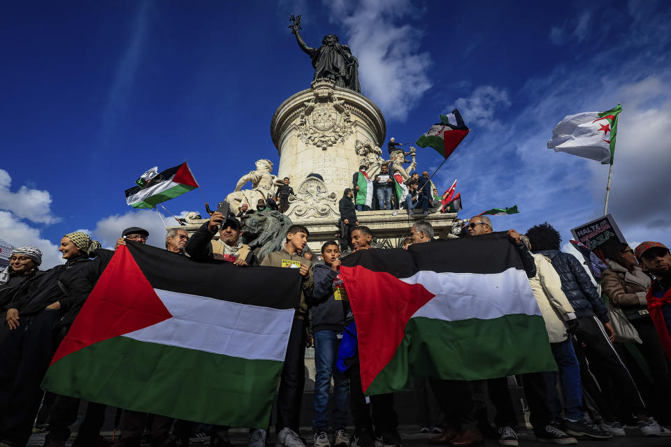 Protesters take part during a demonstration organized by the "National Collective for a just and lasting peace between Palestinians and Israelis" in Paris, Sunday, Oct. 22, 2023. (AP Photo/Aurelien Morissard)