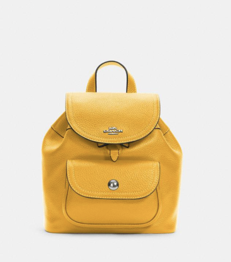 Pennie Backpack 22 in Ochre (Photo via Coach Outlet)