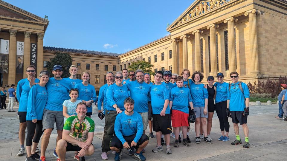 This year's participants after their 30-mile ride and run up the Rocky Steps. (Tim Ogden)