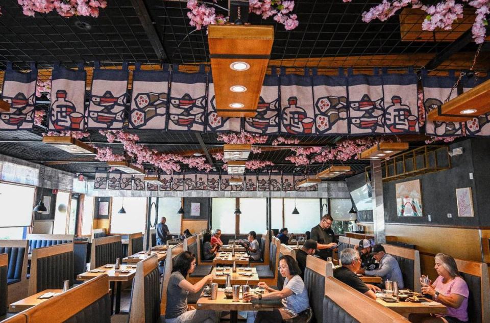 A vibrant dining room greets customers at Tsukiji Japanese Cuisine, which offers an all-you-can-eat menu now open in the former California Pizza Kitchen location on the corner of Blackstone and Nees avenues in north Fresno.