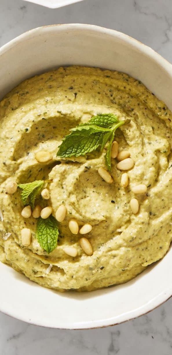 <p>For a fun, summery twist on baba ganoush, try swapping out eggplants for zucchini to take advantage of the summer squash in its peak season.</p><p><em><a href="https://www.goodhousekeeping.com/food-recipes/easy/a28507046/zucchanoush-recipe/" rel="nofollow noopener" target="_blank" data-ylk="slk:Get the recipe for Zucchanoush »;elm:context_link;itc:0;sec:content-canvas" class="link ">Get the recipe for Zucchanoush »</a></em></p><p><strong>RELATED: </strong><a href="https://www.goodhousekeeping.com/food-recipes/g4320/summer-squash-recipes/" rel="nofollow noopener" target="_blank" data-ylk="slk:12 Light and Easy Summer Squash Recipes;elm:context_link;itc:0;sec:content-canvas" class="link ">12 Light and Easy Summer Squash Recipes</a></p>