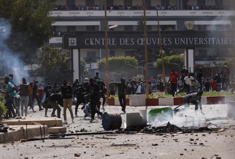 Supporters of opposition leader Ousmane Sonko clash with security forces after Sonko was arrested following accusation of sexual assault in Dakar
