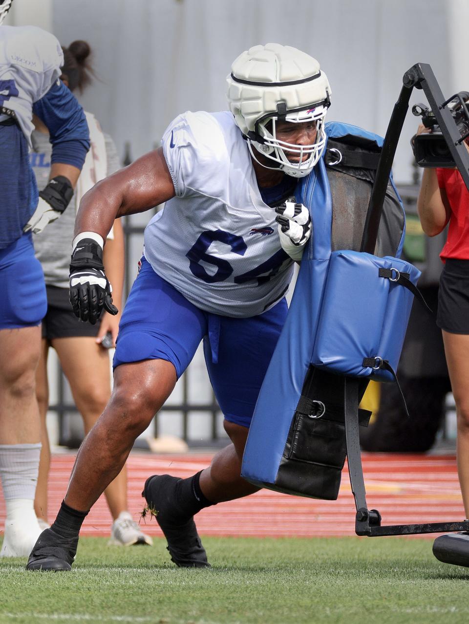 Bills offensive lineman O’Cyrus Torrence on the blocking sled during training camp.