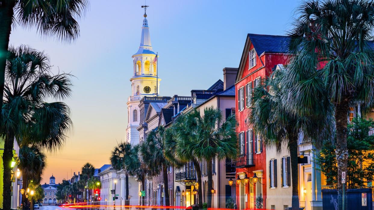 Charleston, South Carolina, USA cityscape in the historic French Quarter at twilight.