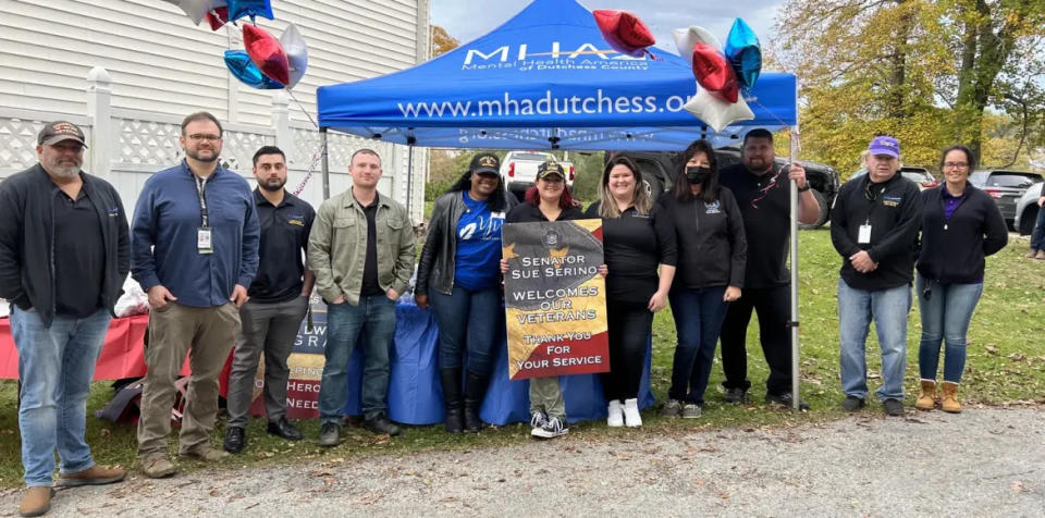 <div class="inline-image__caption"><p>Sharon Toney-Finch, in blue shirt, poses with then-state Sen. Sue Serino and other veterans at a 2021 event.</p></div> <div class="inline-image__credit">New York State Senate</div>