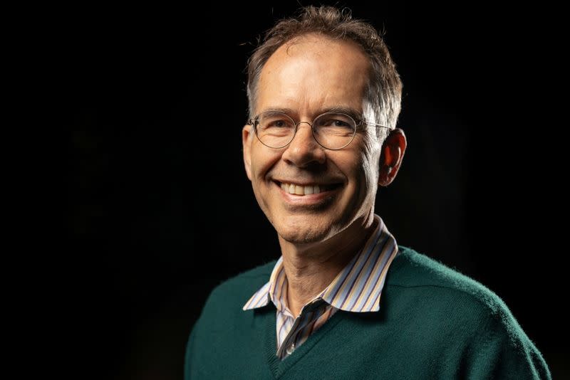 Stanford University economist Guido Imbens, who won the 2021 Nobel Prize for Economics, poses at home