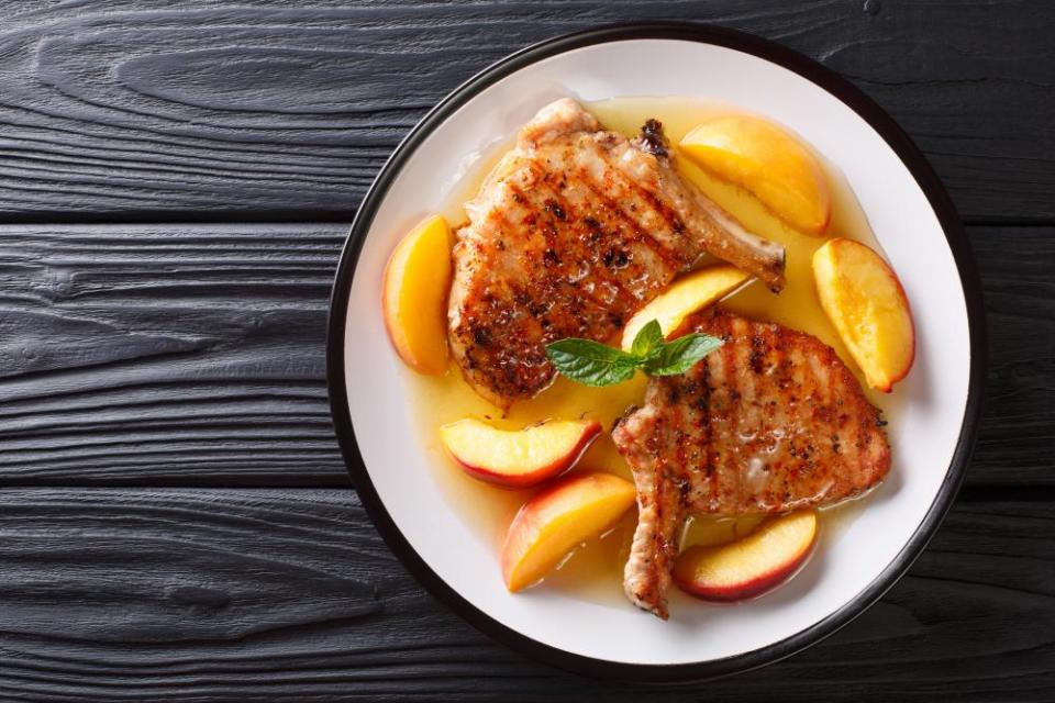 Pork chops with glazed peaches