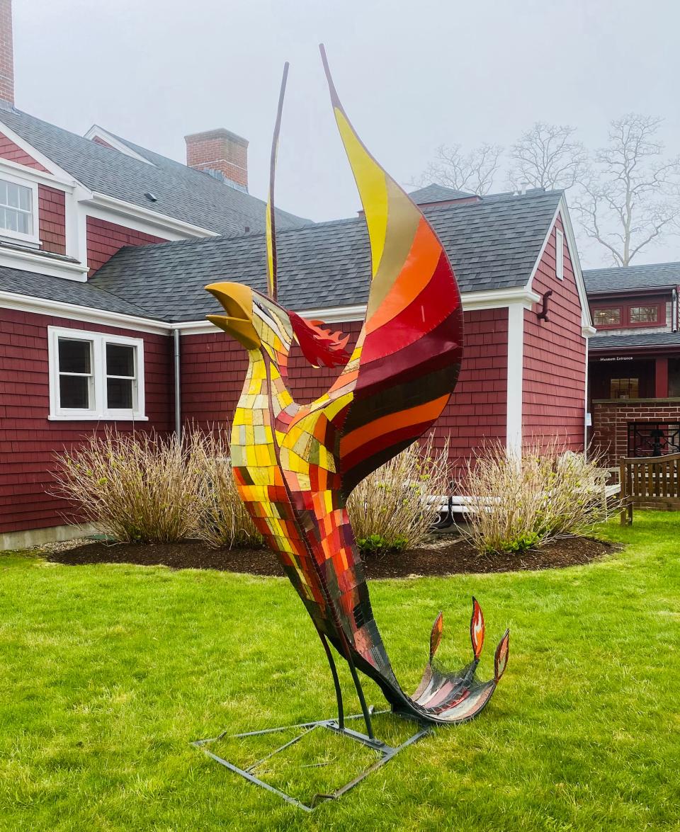 Robin Tost's metal sculpture "Phoenix" is now rising from  the grounds of the Cahoon Museum of American Art in Cotuit.